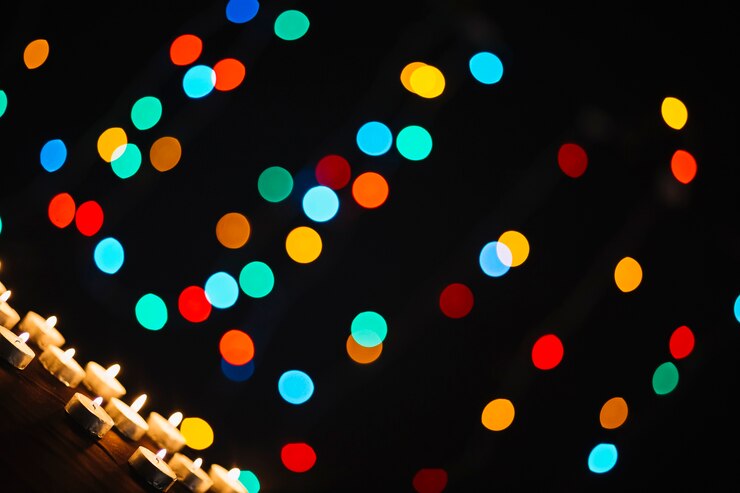 Gratis Foto heldere lichte vlekken dichtbij kaarsen