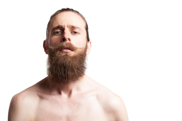 Gratis foto hipster met een lange baard op een witte achtergrond in studiofoto