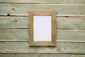 Gratis foto houten frame met lichte houten achtergrond