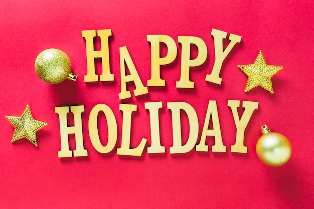 Houten happy holiday belettering