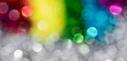 Gratis foto intreepupil sprankelende regenboog glitter