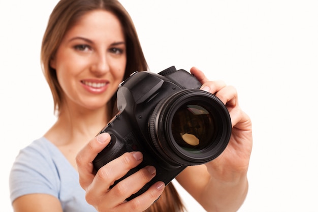 Jonge blanke vrouw met camera