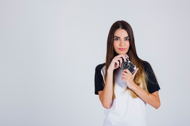 Jonge fotograaf poseren