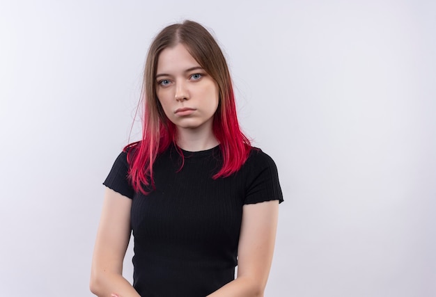 jonge mooie vrouw, gekleed in zwart t-shirt op geïsoleerde witte muur