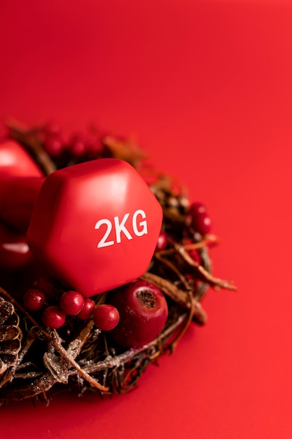 Gratis foto kerst fitnessgewichten voor trainingscadeau