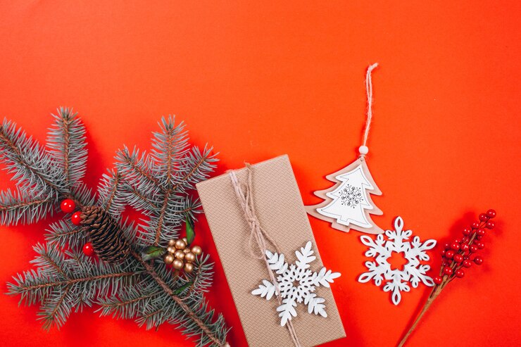 Gratis Foto kerstmis achtergrondlay-out op rode achtergrond