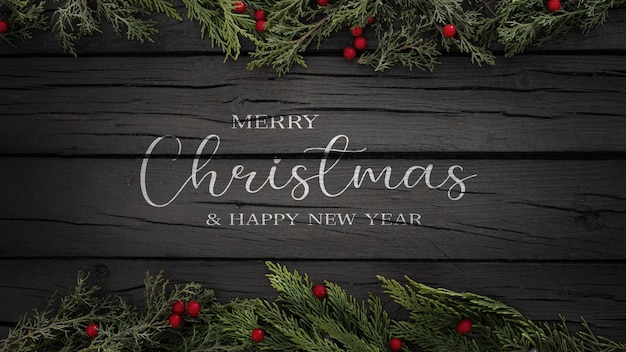 Gratis foto kerstmisachtergrond met slinger en ballen op een zwarte rustieke houten achtergrond