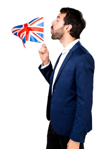 Knappe man met een Britse vlag