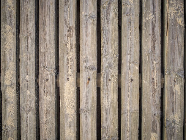 Gratis foto koele achtergrond van een muur met houten planken