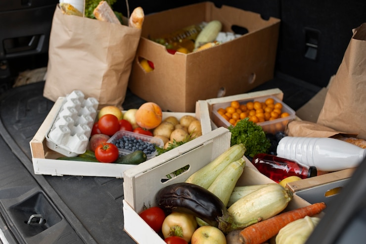 Gratis Foto koerier bezorgt boodschappen aan huis