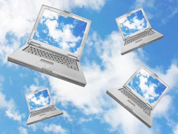 Laptops die van een blauwe lucht vallen