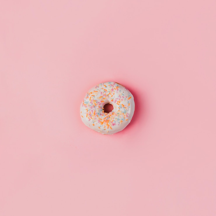 Gratis Foto leuke donut op roze