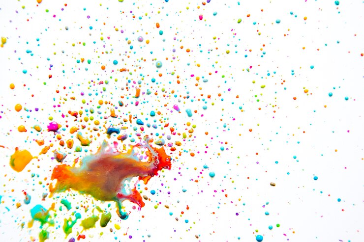 Gratis Foto levendige mix van verf druppels op wit