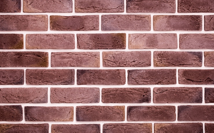 Gratis Foto lichtrode bakstenen muur, creatieve back-phonon, close-up
