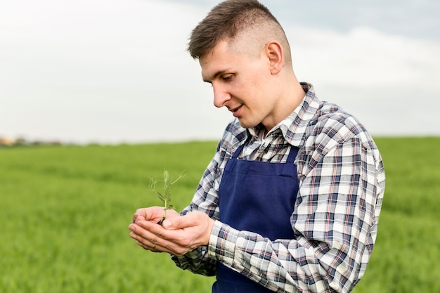 Gratis foto man bedrijf plant