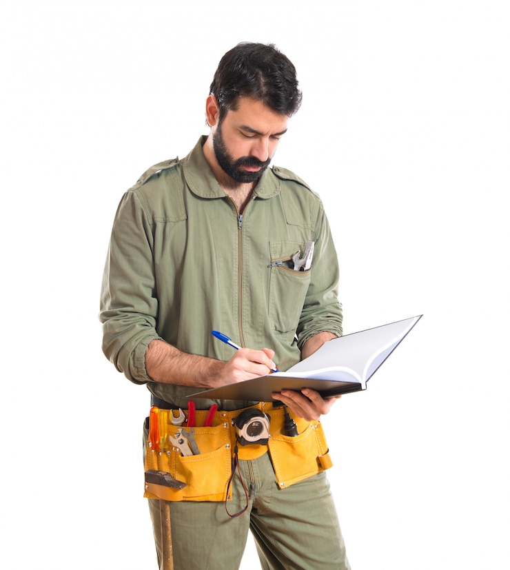 Gratis Foto mechanic schrijven op boek
