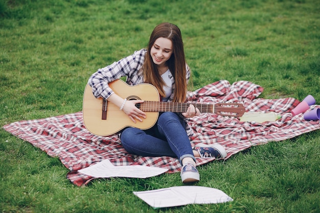 Meisje met een gitaar