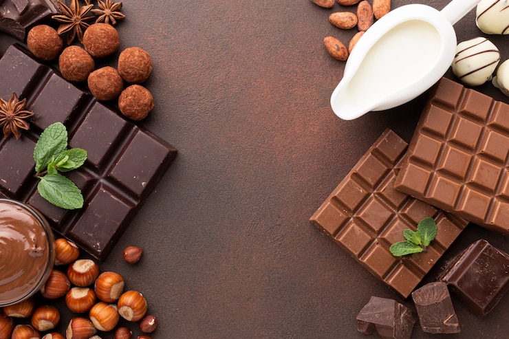 Gratis Foto melk en smakelijke chocolade bovenaanzicht