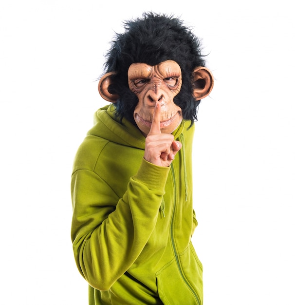Gratis foto monkey man maakt stilte gebaar