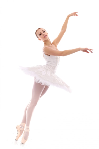 Mooie en prachtige ballerina in ballete pose