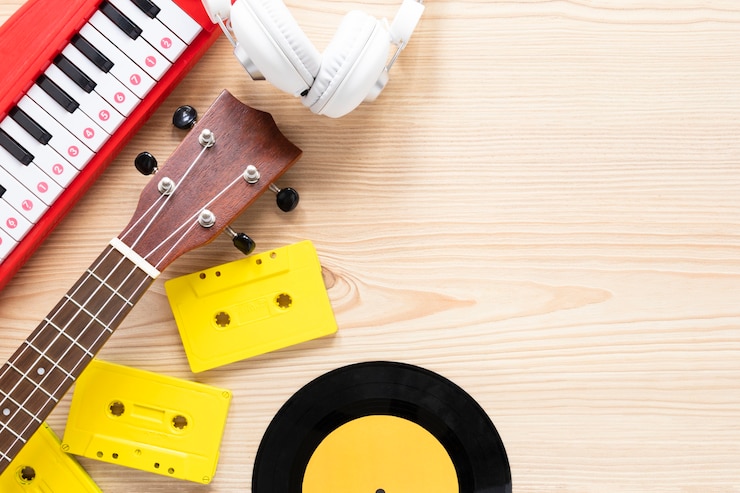 Gratis Foto muziekconcept op een houten achtergrond