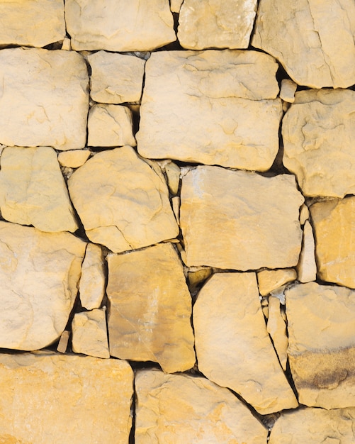 Gratis foto natuurlijke bruine rotsmuur