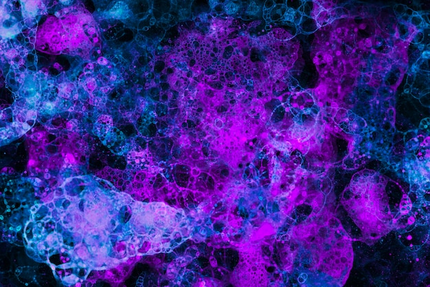 Neon paarse bubbel kunst op zwarte achtergrond abstracte stijl