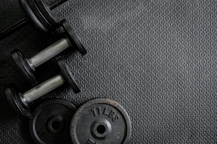 Gratis Foto oefengewichten - ijzeren dumbbell met extra platen