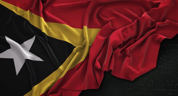 Oost-Timor Vlag Gerimpelde Op Donkere Achtergrond 3D Render