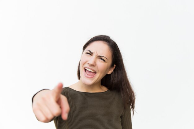 Opgewonden mooie vrouw wijzende vinger