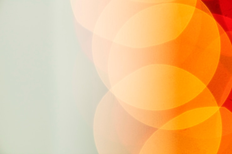 Gratis Foto oranje bokeh licht achtergrond