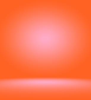 Oranje fotografische studioachtergrond verticaal met zacht vignet. zachte gradiëntachtergrond. geschilderd canvas studio achtergrond.