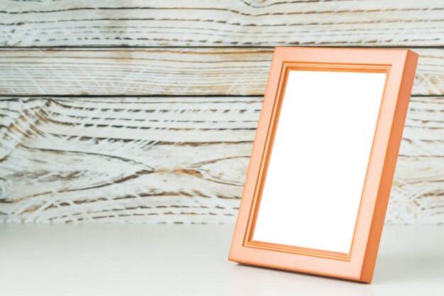 Oranje frame met houten achtergrond