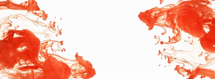 Gratis Foto oranje inkt lost op in water, witte geïsoleerde achtergrond. onttrekking in beweging, kleurrijke inkt circuleert in het water