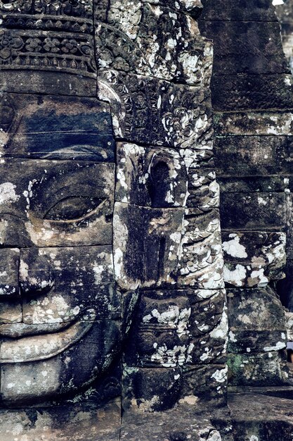 Oude stenen gezichten van Bayon tempel, Angkor Wat, Siam Reap, Cambodja.