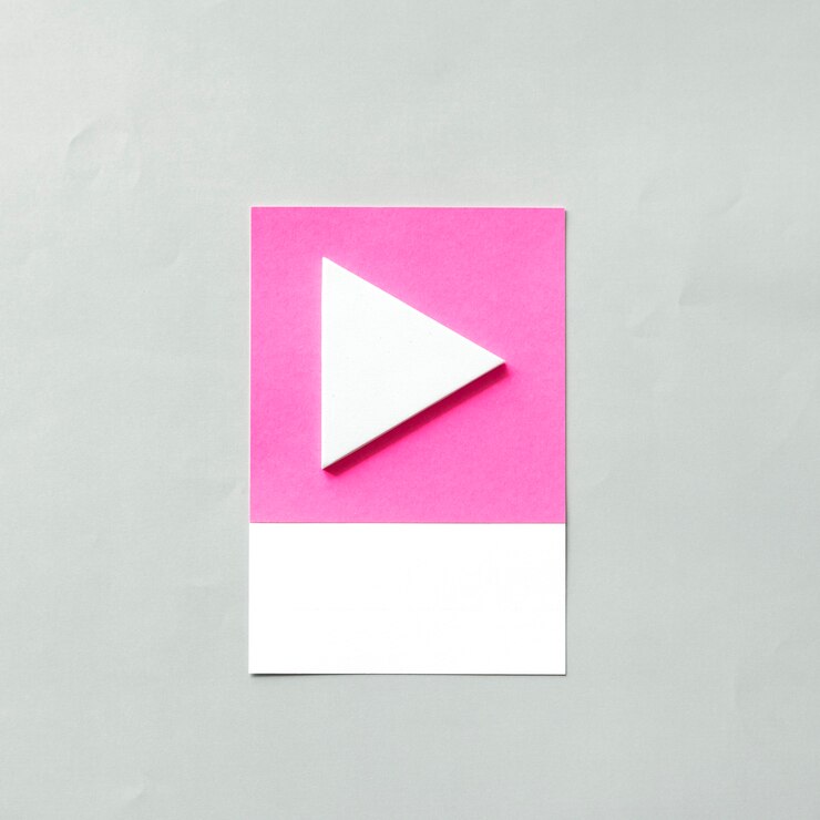 Gratis Foto papier ambachtelijke kunst van play-knop