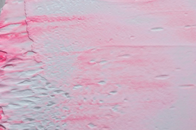 Patroon van ruwe geweven roze en witte geschilderde muur
