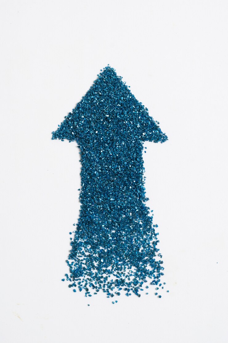Gratis Foto pijl omhoog gemaakt van glitter