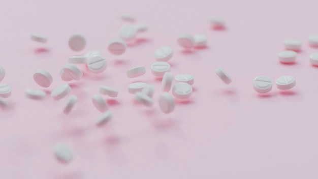 Pillenregeling op roze achtergrond