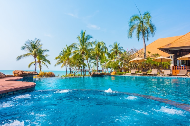 Gratis Foto pool palm sunset landscape zee