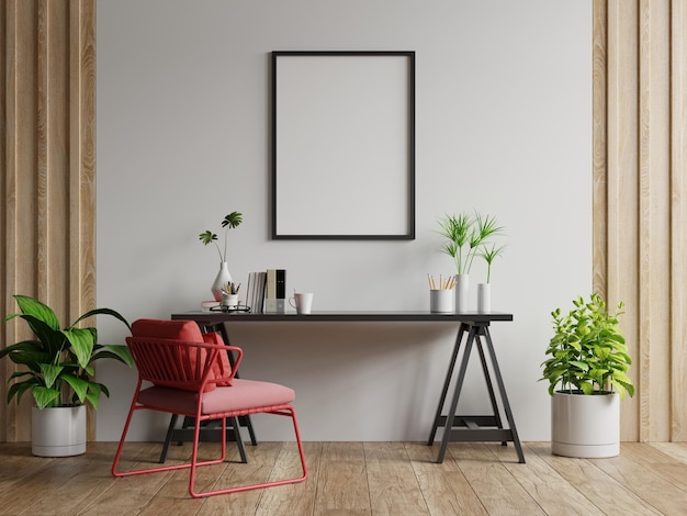 Postermodel met verticale frames op lege witte muur in woonkamerinterieur met rode fauteuil
