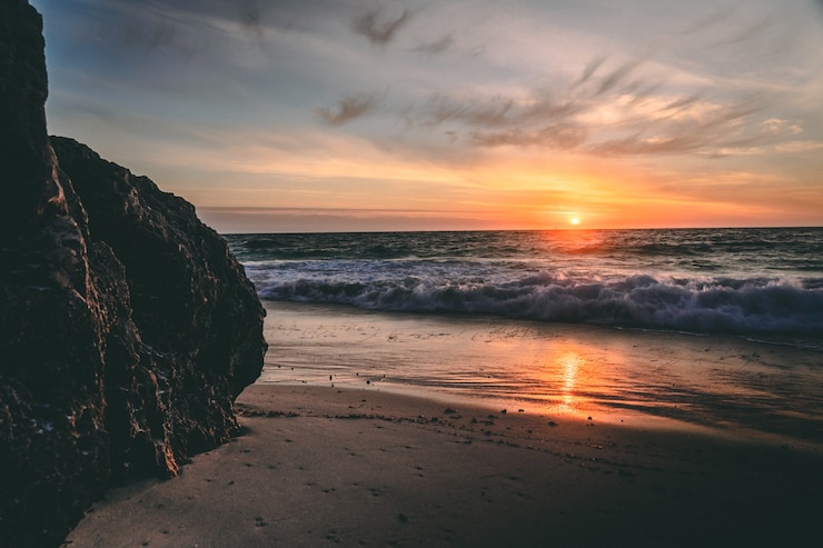 Gratis Foto prachtige zonsondergang boven de zee