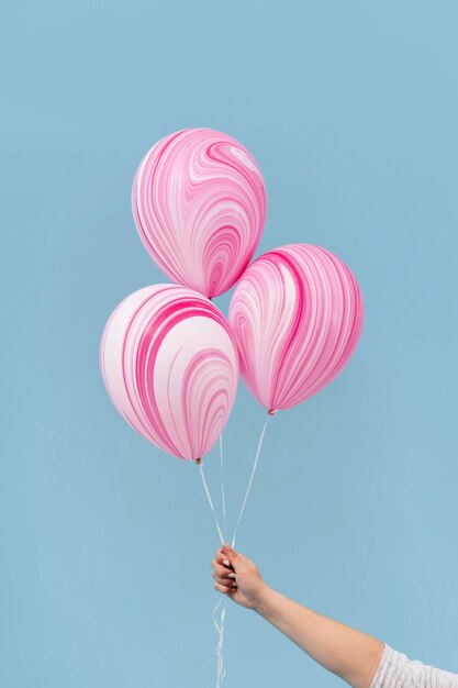 Gratis foto regeling van abstracte roze ballonnen