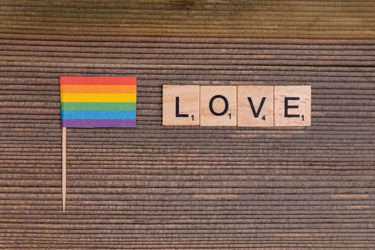 Gratis Foto regenboog lgbt-vlag met liefdeteken