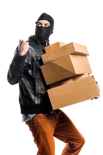 Robber holding boxes