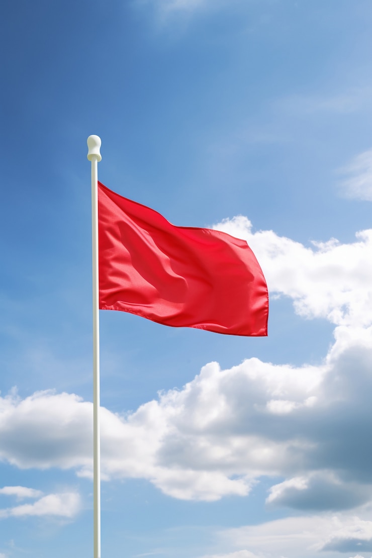 Gratis Foto rode vlag op het veld