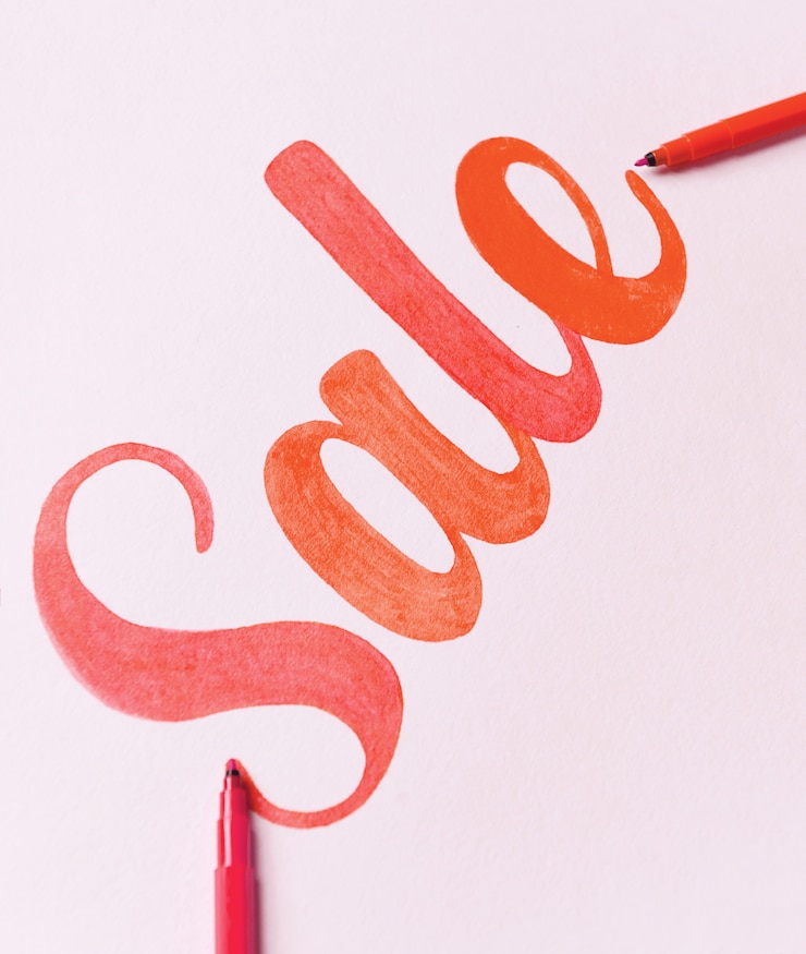 Gratis Foto rood geschilderde belettering verkoop