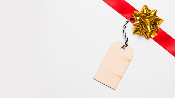 Gratis Foto rood lint met klein papier