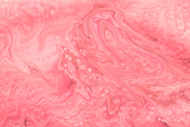 Roze abstracte gemengde verfachtergrond