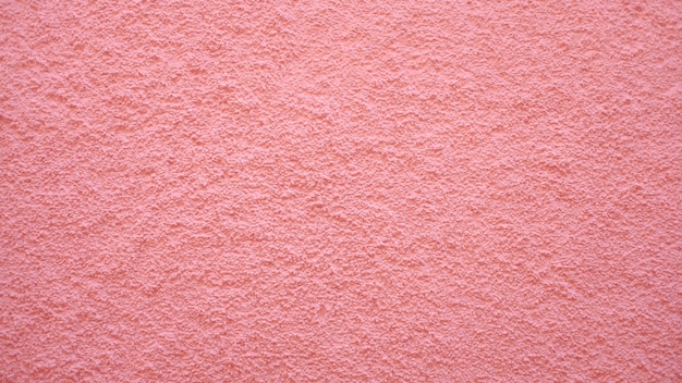 Gratis foto roze muur textuur achtergrond